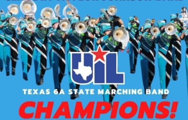 Marching band performing with championship banner.